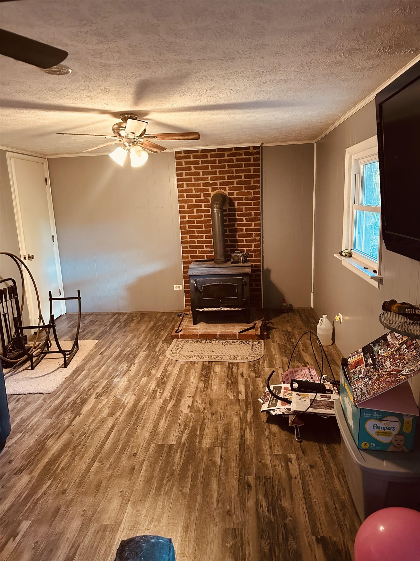 562 Dabneys Road Raphine, VA 24472 - Photo 14 of 14 a bedroom with a bed and a flat tv screen on the dresser