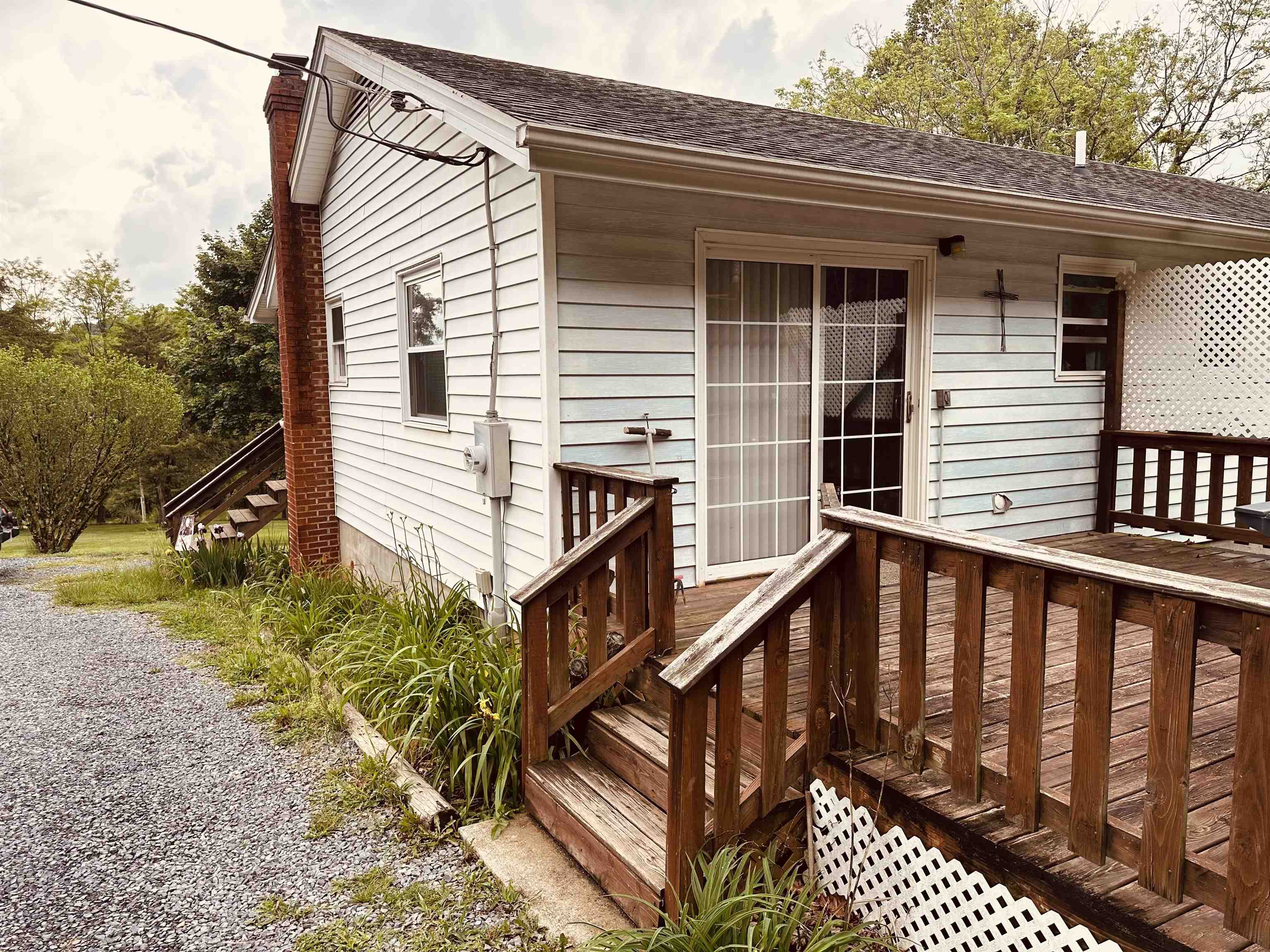 562 Dabneys Road Raphine, VA 24472 - Photo 3 of 14 a view of a house with backyard and sitting area