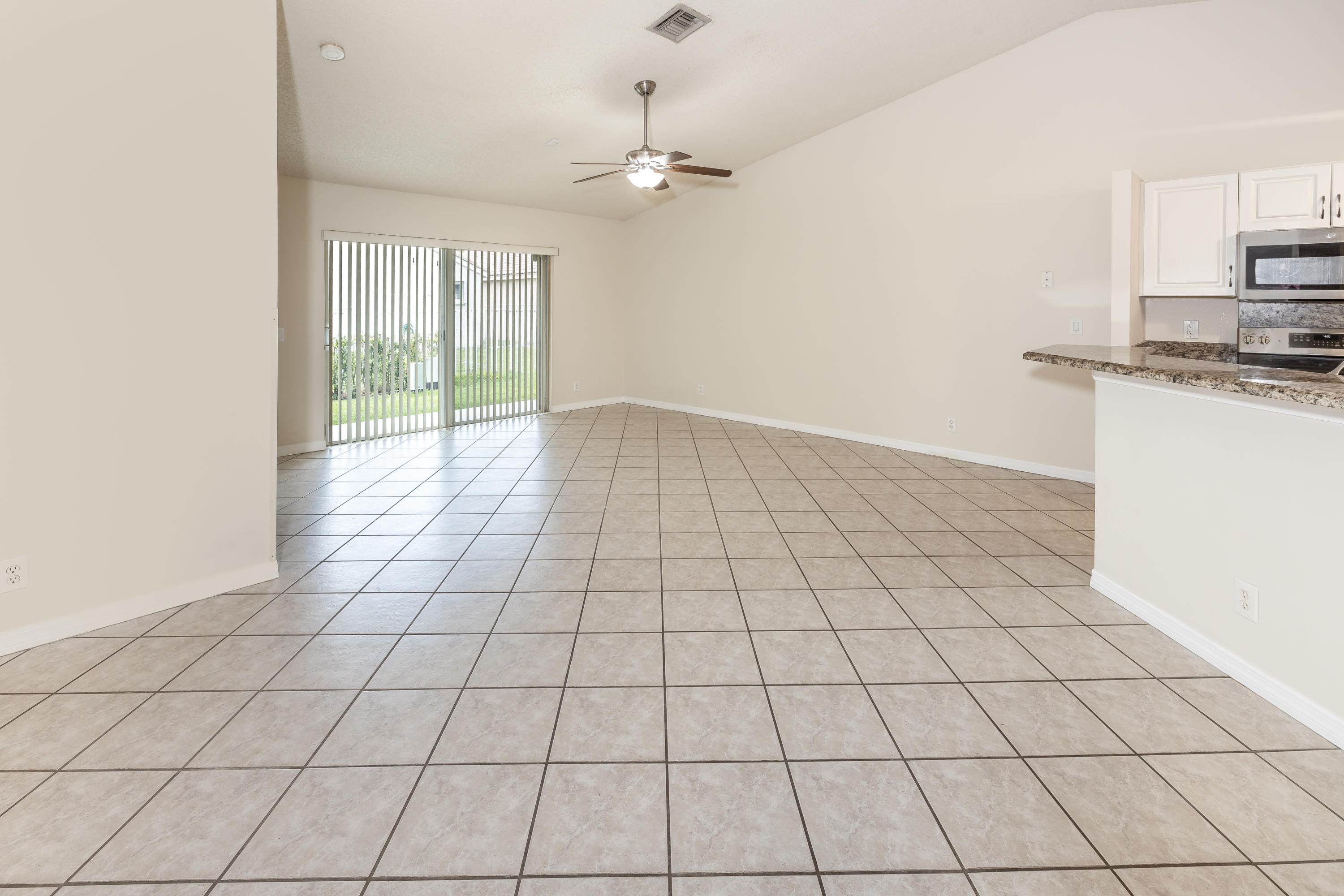 4244 Pine Ridge Court Weston, FL 33331 - Photo 14 of 34 a view of an empty room and window