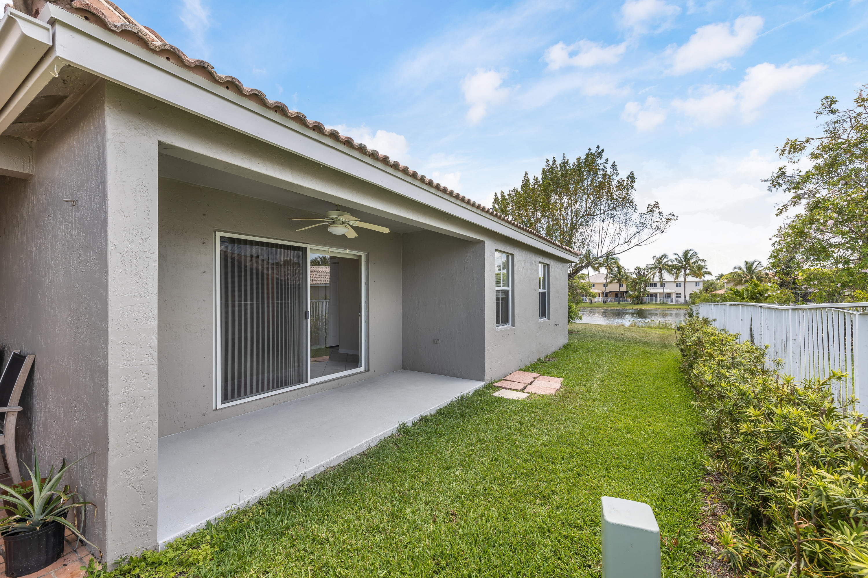 4244 Pine Ridge Court Weston, FL 33331 - Photo 23 of 34 a view of a back yard of the house