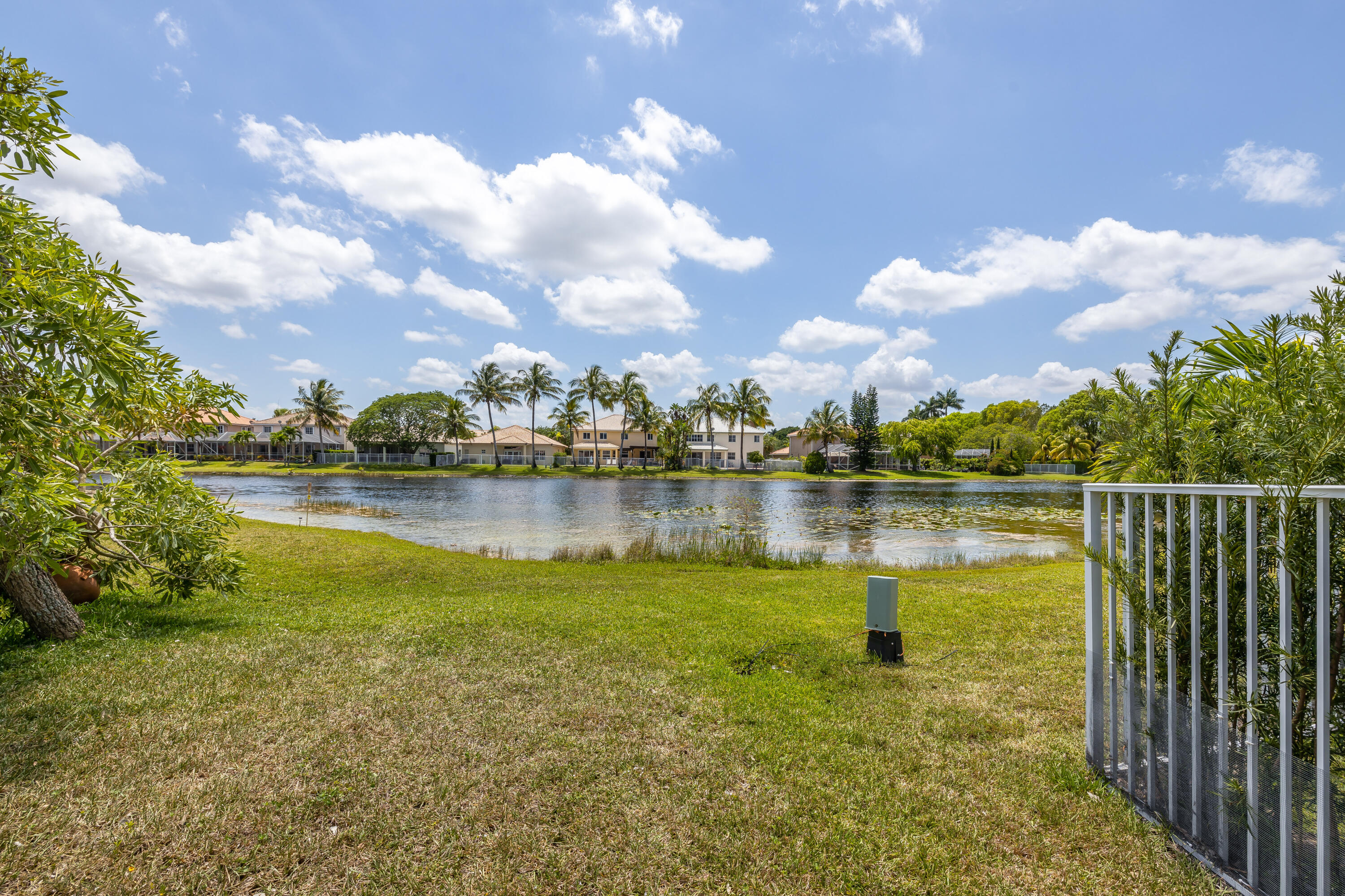 4244 Pine Ridge Court Weston, FL 33331 - Photo 25 of 34 a view of a lake in front of house