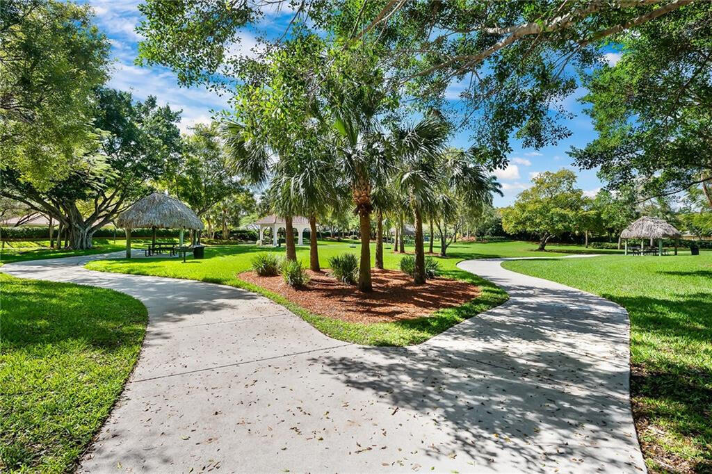 4244 Pine Ridge Court Weston, FL 33331 - Photo 30 of 34 a view of a park with large trees