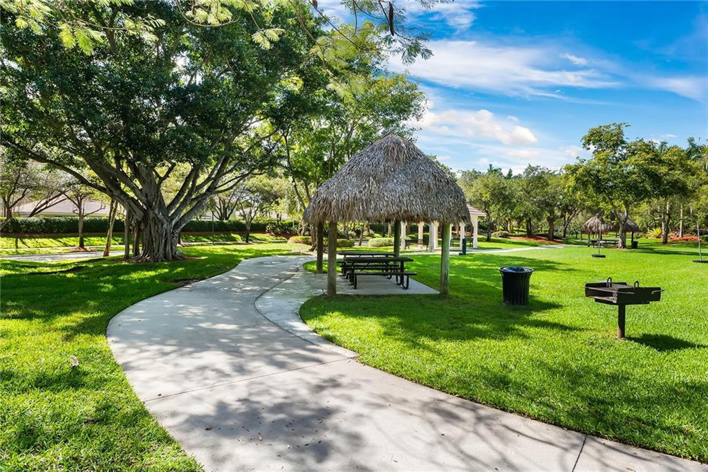 4244 Pine Ridge Court Weston, FL 33331 - Photo 31 of 34 a view of a park with large trees