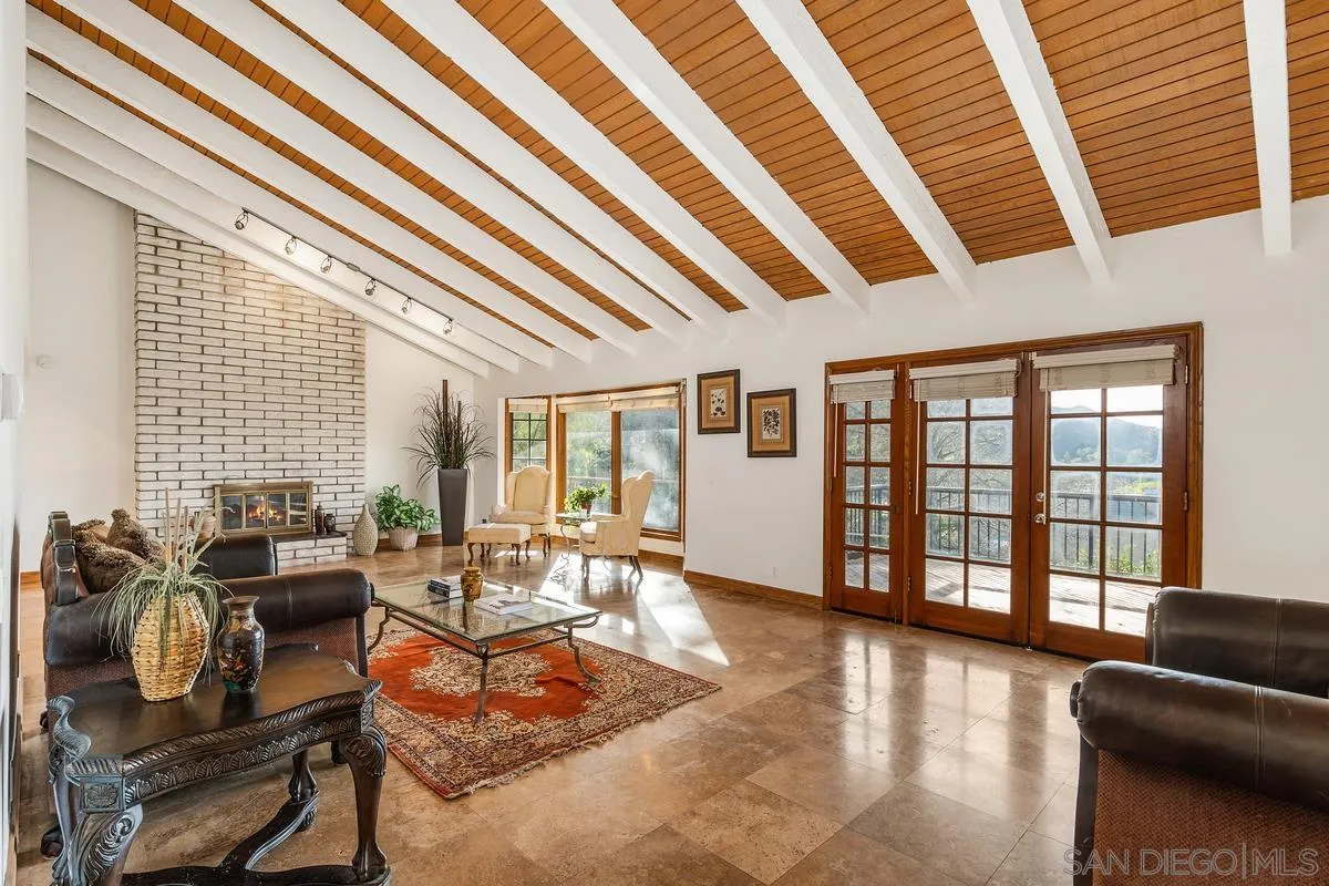 15918 Lime Grove Road Poway, CA 92064 - Photo 19 of 53 a living room with furniture and large windows
