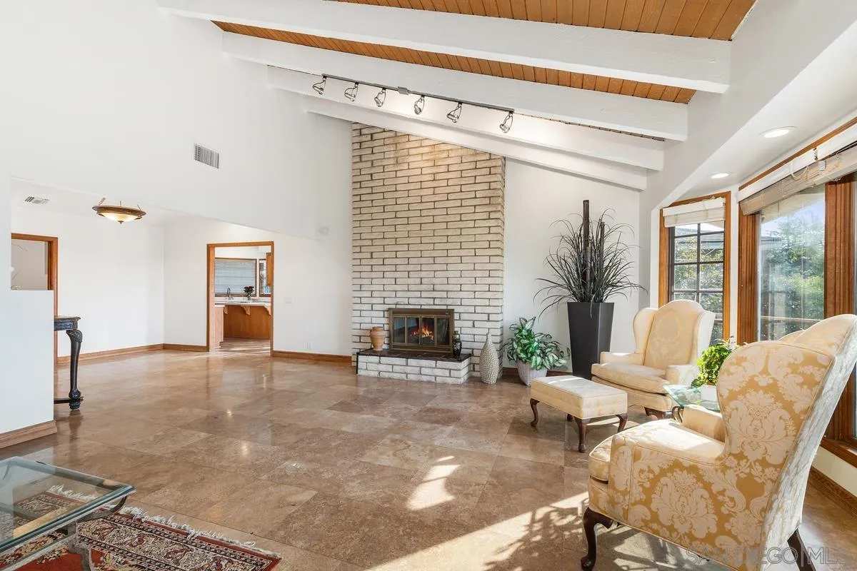 15918 Lime Grove Road Poway, CA 92064 - Photo 21 of 53 a living room with furniture and a fireplace