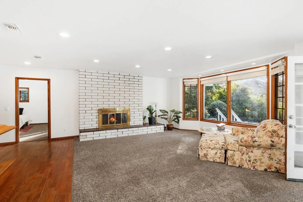 15918 Lime Grove Road Poway, CA 92064 - Photo 27 of 53 a view of a livingroom with furniture fireplace and window
