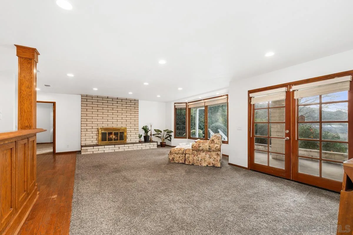 15918 Lime Grove Road Poway, CA 92064 - Photo 28 of 53 a living room with furniture and large windows