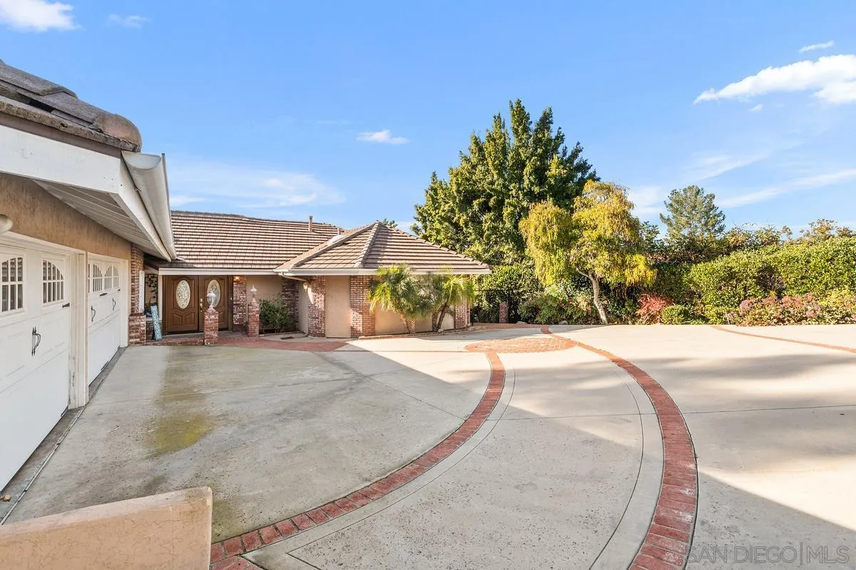 15918 Lime Grove Road Poway, CA 92064 - Photo 3 of 53 a view of a house with a yard