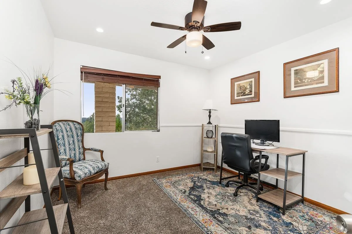 15918 Lime Grove Road Poway, CA 92064 - Photo 32 of 53 a view of a workspace with furniture and a window