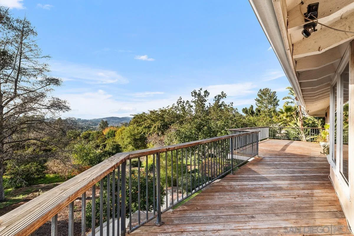 15918 Lime Grove Road Poway, CA 92064 - Photo 37 of 53 a view of a balcony with wooden floor and fence