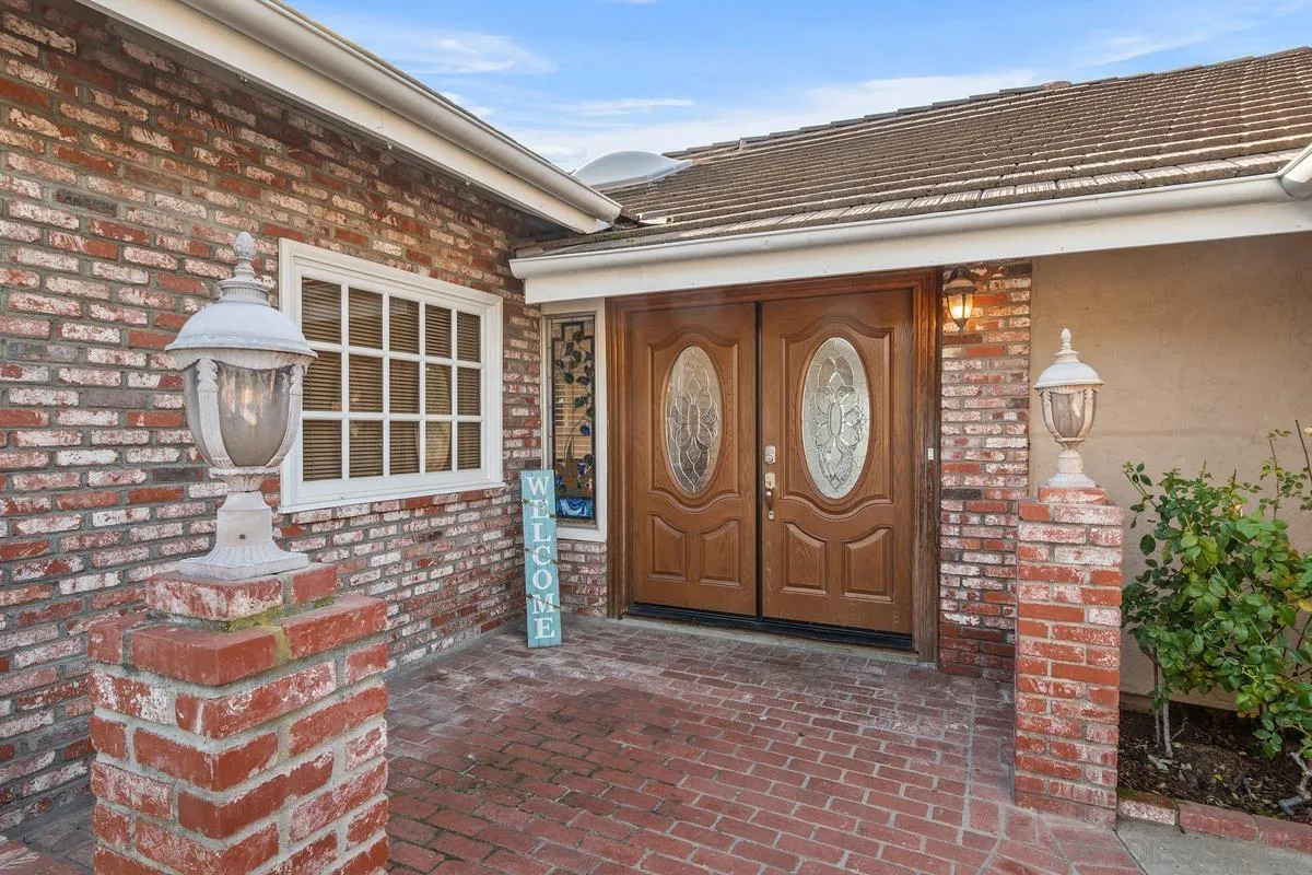 15918 Lime Grove Road Poway, CA 92064 - Photo 4 of 53 a front view of a house with entryway