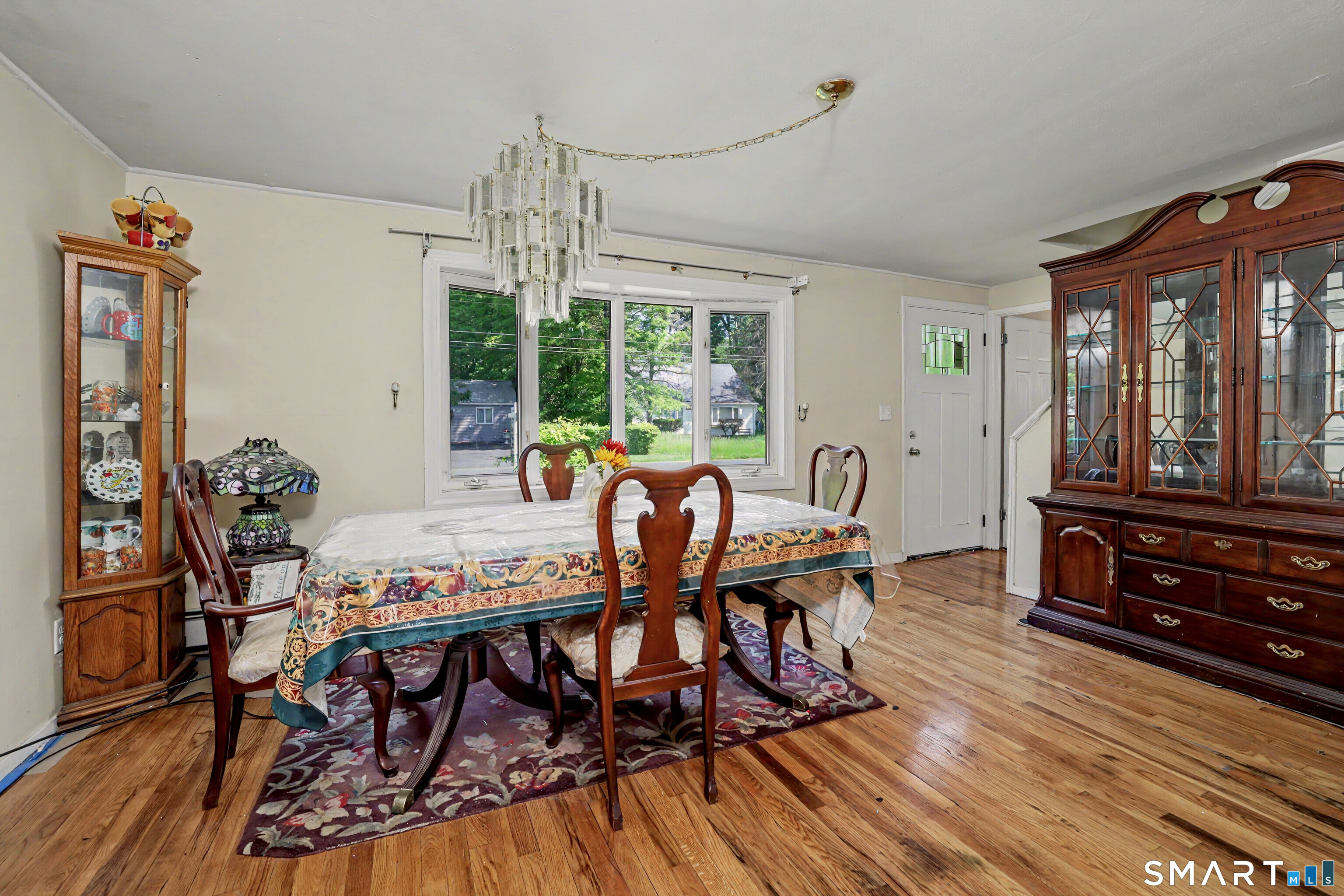 97 Boothbay Street Bloomfield, CT 06002 - Photo 12 of 33 a view of a dining room with furniture window and outside view