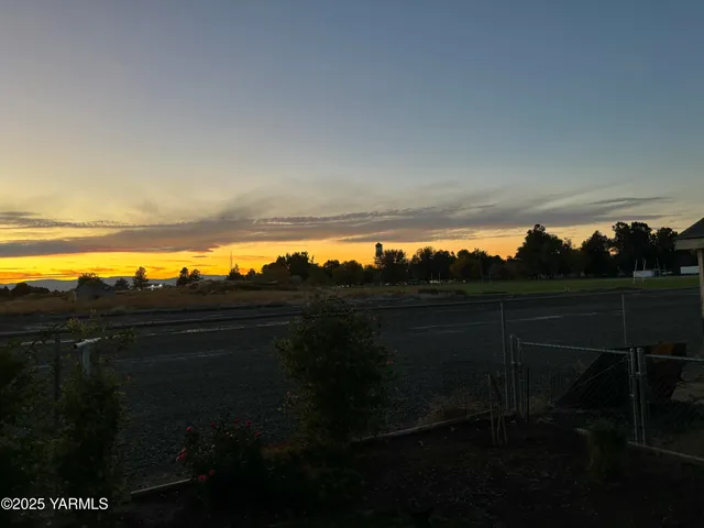 a view of outdoor space and yard