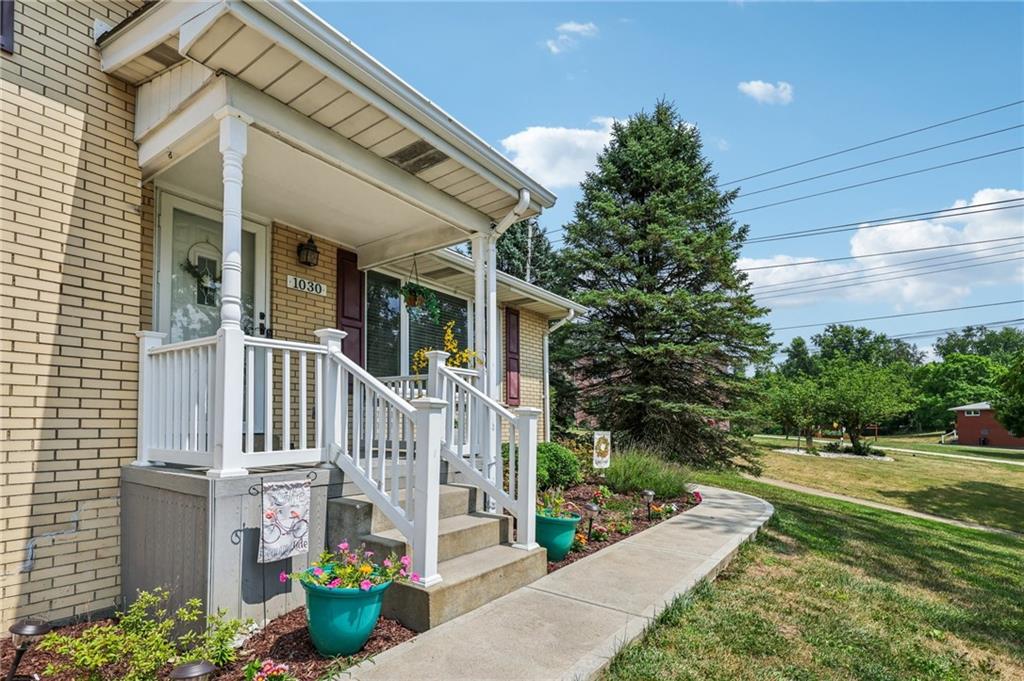 1030 Silver Lane McKees Rocks, PA 15136 - Photo 3 of 31 a front view of a house with a garden