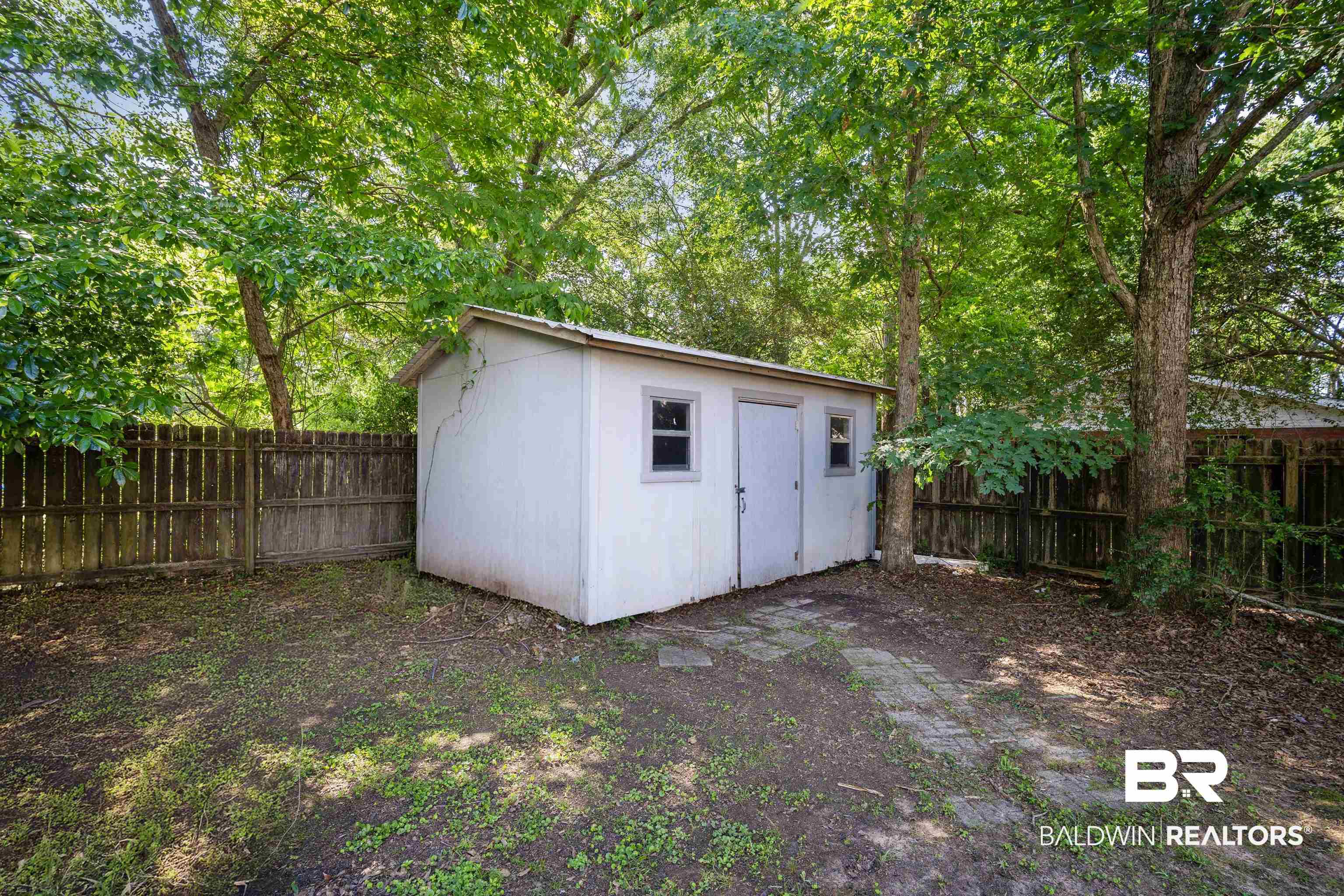 3075 Azalea Trace Drive Mobile, AL 36695 - Photo 33 of 33 View of shed featuring a fenced backyard