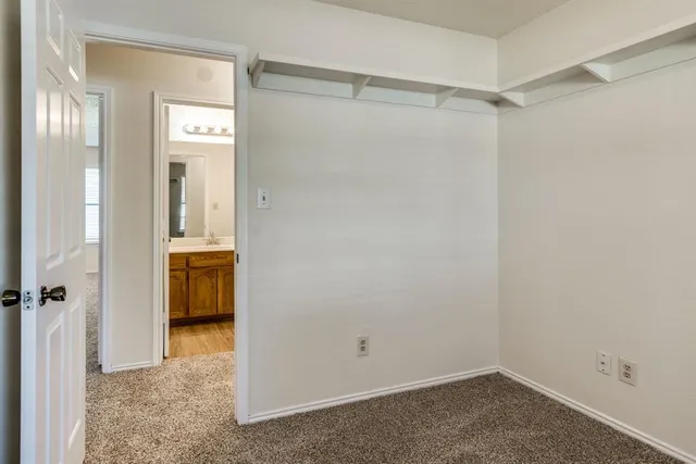 a view of a room with a wardrobe space