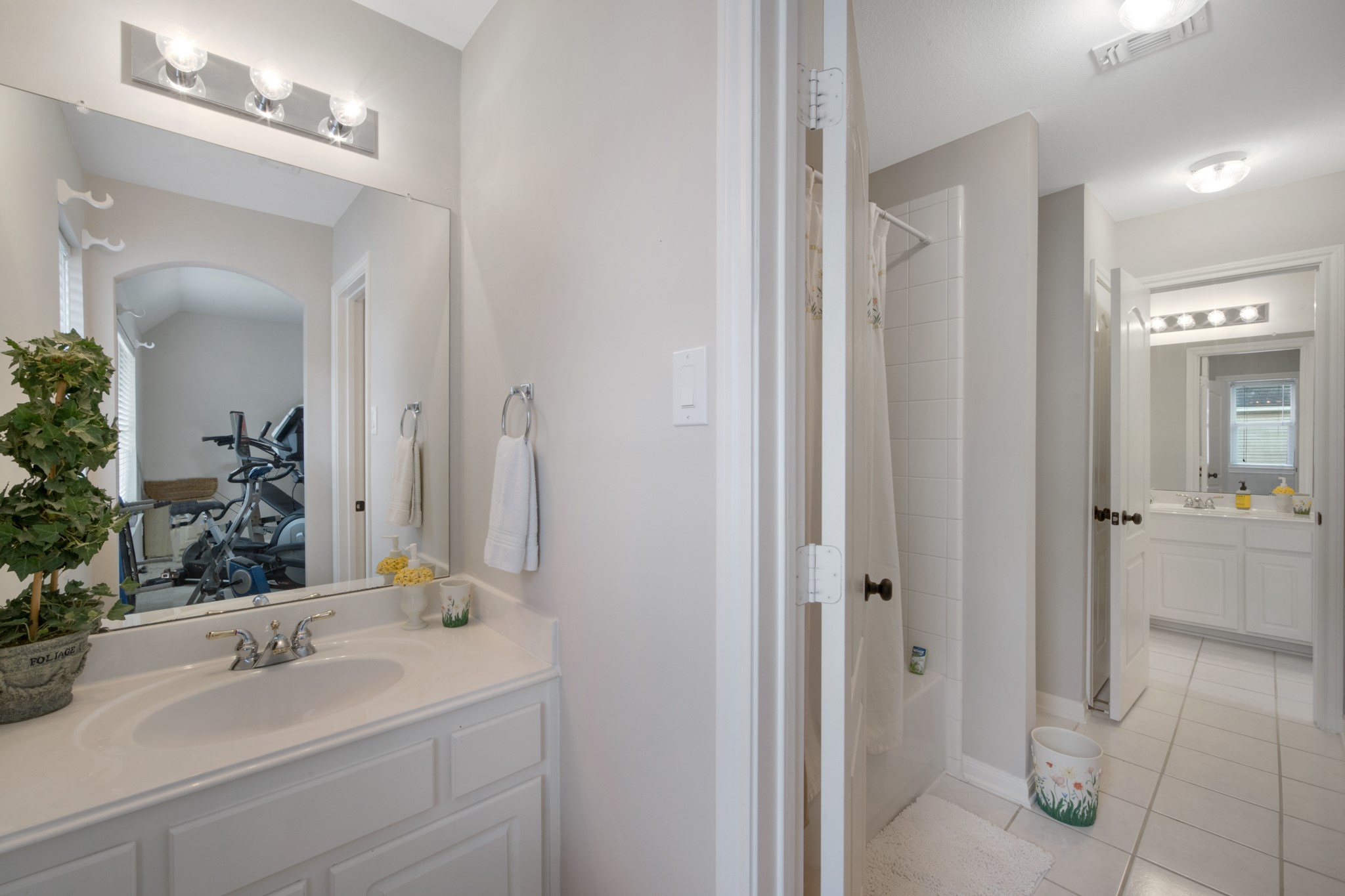 9510 Ashdown Forest Drive Spring, TX 77379 - Photo 32 of 50 JACK AND JILL BATHROOM #1 – convenient shared bathroom connecting the upstairs bedrooms. Features a spacious vanity and separate shower area for functionality and privacy.