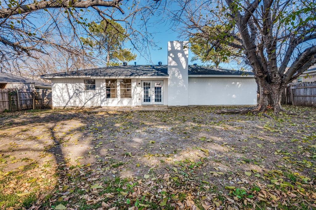 2102 East Timberview Lane Arlington, TX 76014 - Photo 2 of 10 front view of a house with a yard