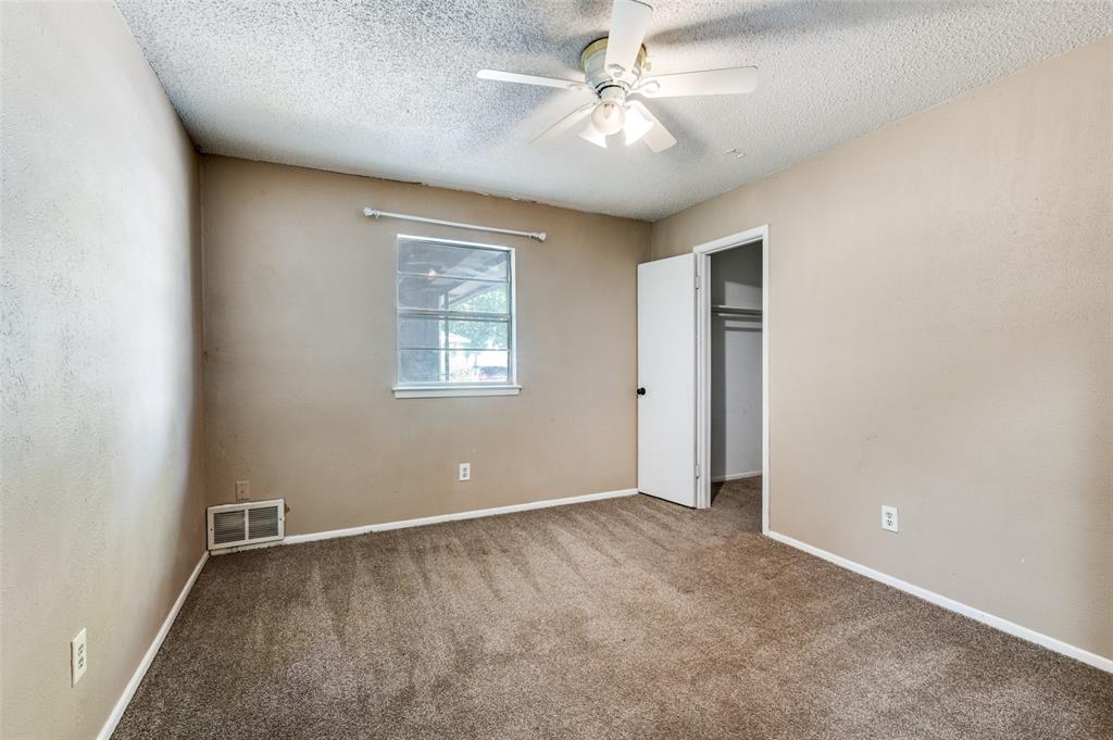 2102 East Timberview Lane Arlington, TX 76014 - Photo 6 of 10 an empty room with fan and windows