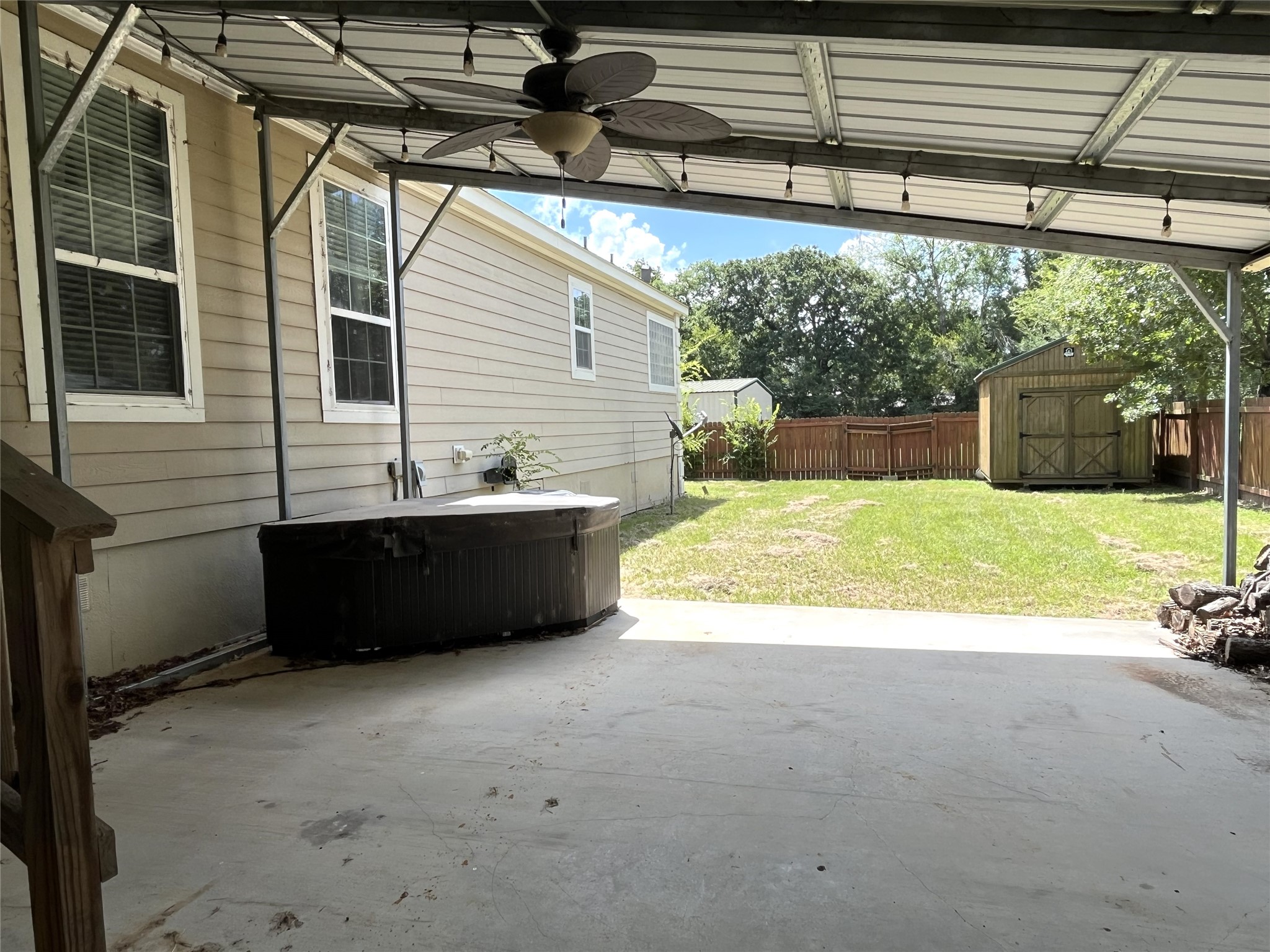 19989 Post Oak Loop Thornton, TX 76687 - Photo 14 of 38 Fenced Back Yard with Hot Tub and 10x12 Storage Shed