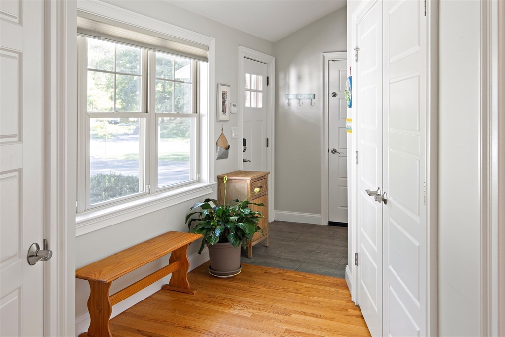 22 Peachtree Road Lexington, MA 02420 - Photo 14 of 42 a view of an entryway of house and wooden floor