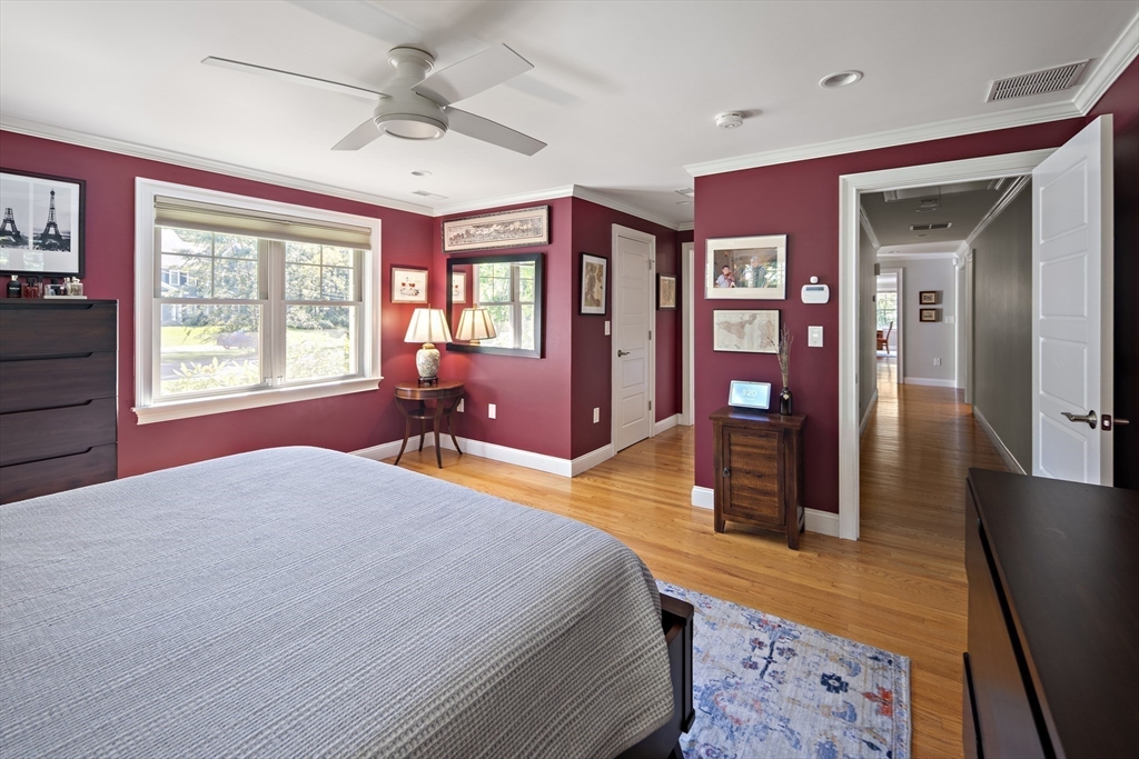 22 Peachtree Road Lexington, MA 02420 - Photo 17 of 42 a bedroom with a bed dresser and a large window