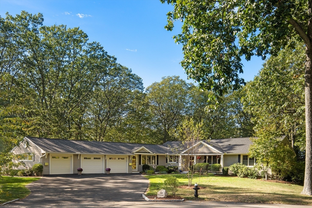 22 Peachtree Road Lexington, MA 02420 - Photo 2 of 42 a front view of a house with garden