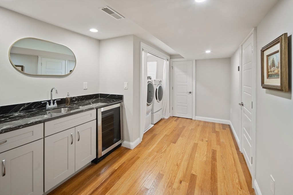 22 Peachtree Road Lexington, MA 02420 - Photo 25 of 42 a spacious bathroom with a sink and a mirror