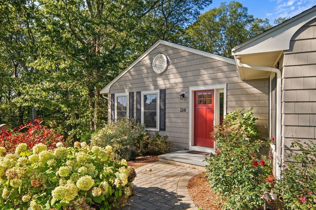 22 Peachtree Road Lexington, MA 02420 - Photo 30 of 42 a front view of a house with a yard
