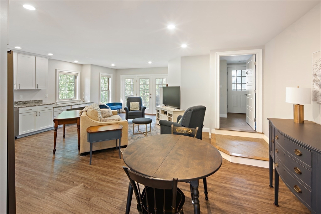 22 Peachtree Road Lexington, MA 02420 - Photo 32 of 42 a living room with furniture and a wooden floor