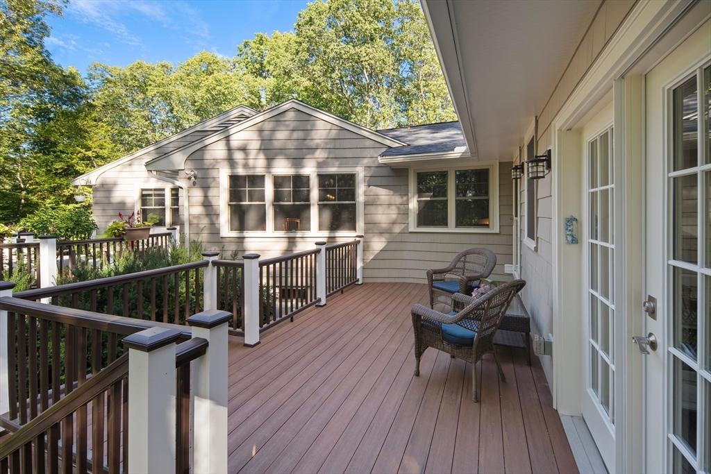 22 Peachtree Road Lexington, MA 02420 - Photo 35 of 42 a view of a house with backyard and sitting area