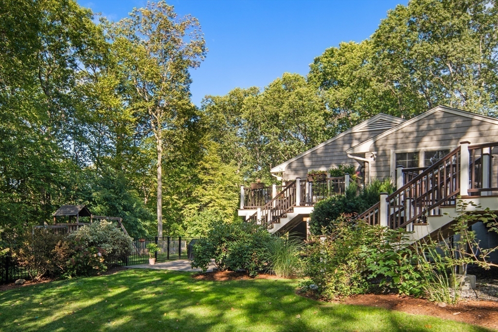 22 Peachtree Road Lexington, MA 02420 - Photo 41 of 42 a view of a house with garden and trees