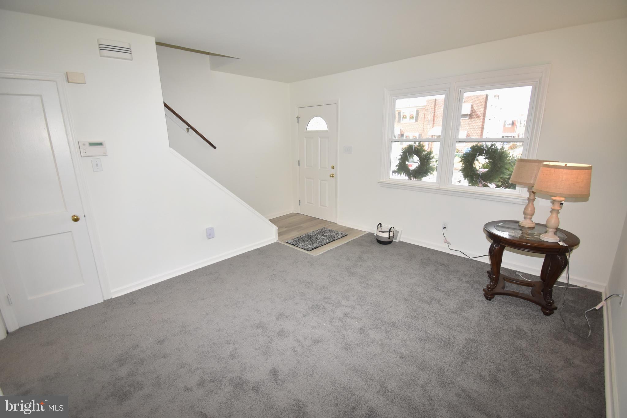 76 West 4th Street Burlington, NJ 08016 - Photo 3 of 15 a view of a livingroom with furniture and a window