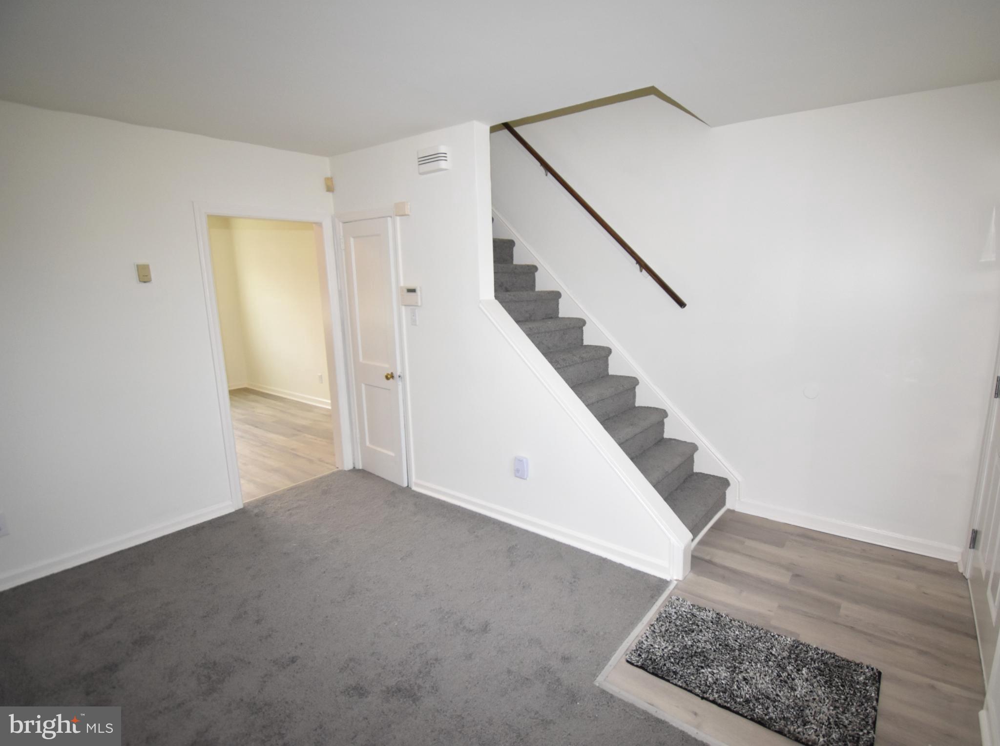 76 West 4th Street Burlington, NJ 08016 - Photo 5 of 15 a view of a hallway with staircase