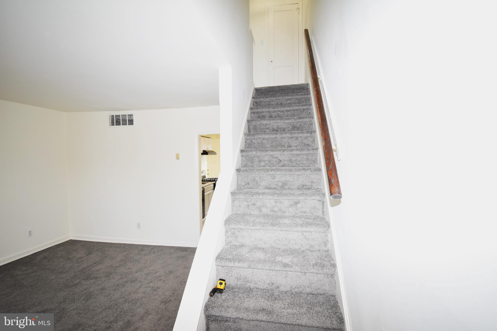 76 West 4th Street Burlington, NJ 08016 - Photo 9 of 15 a view of staircase with white walls
