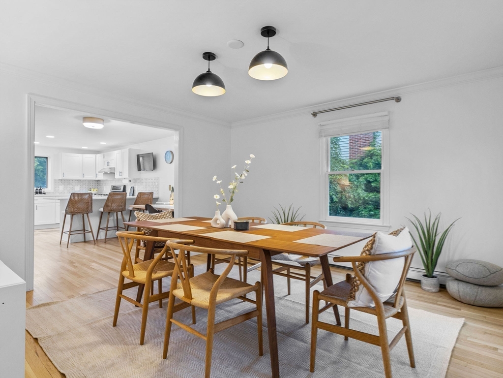 168 Maple Street Boston, MA 02132 - Photo 1 of 39 a view of a dining room with furniture and wooden floor