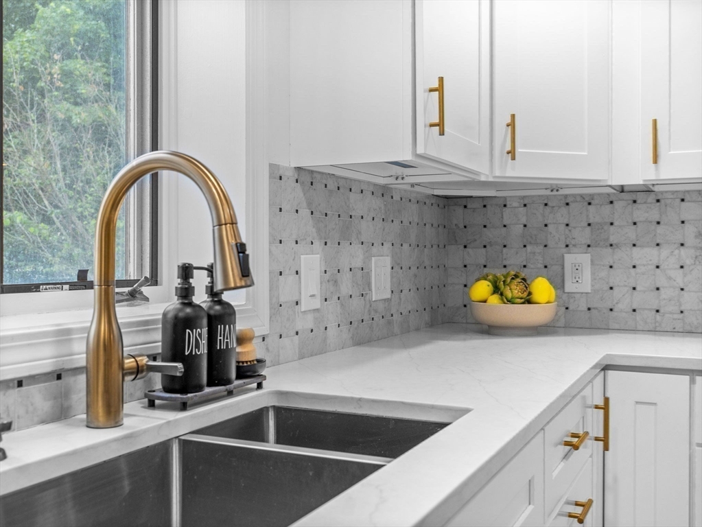 168 Maple Street Boston, MA 02132 - Photo 3 of 39 a close view of sink and tap