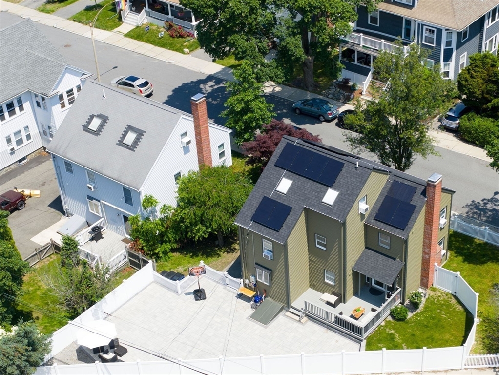 168 Maple Street Boston, MA 02132 - Photo 34 of 39 aerial view of a house with a yard