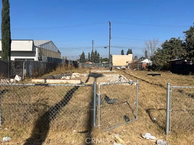 a view of a terrace with wooden fence
