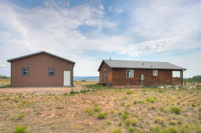 a house with yard in front of it