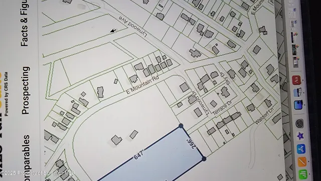 walk in wooden floor with white walls