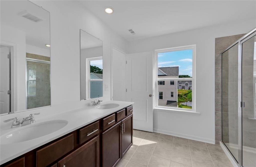 206 Maycrest Path Tucker, GA 30084 - Photo 7 of 18 a bathroom with a sink and a mirror