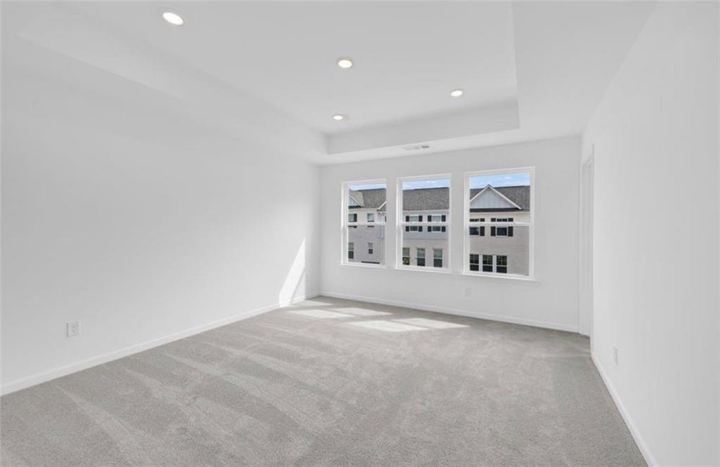 206 Maycrest Path Tucker, GA 30084 - Photo 9 of 18 a view of an empty room with a window