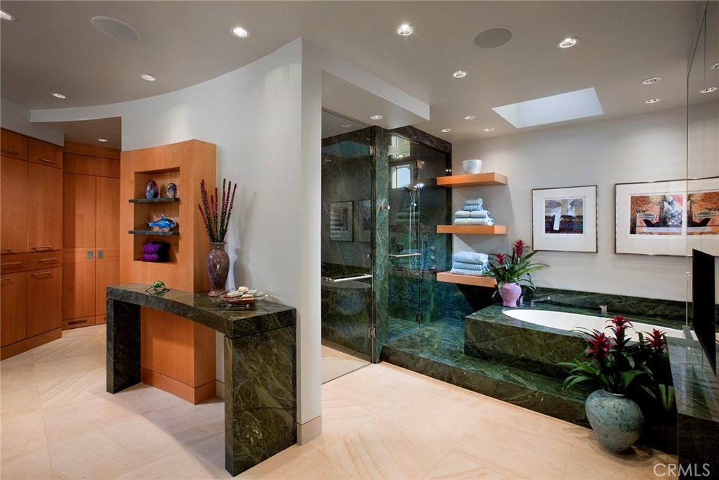 18 Ritz Cove Drive Dana Point, CA 92629 - Photo 12 of 25 a kitchen with stainless steel appliances granite countertop a refrigerator and a stove