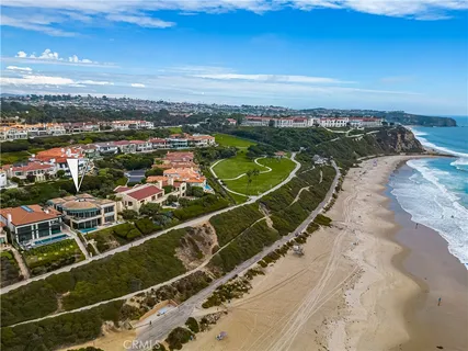 a view of a water heater and a building in the background
