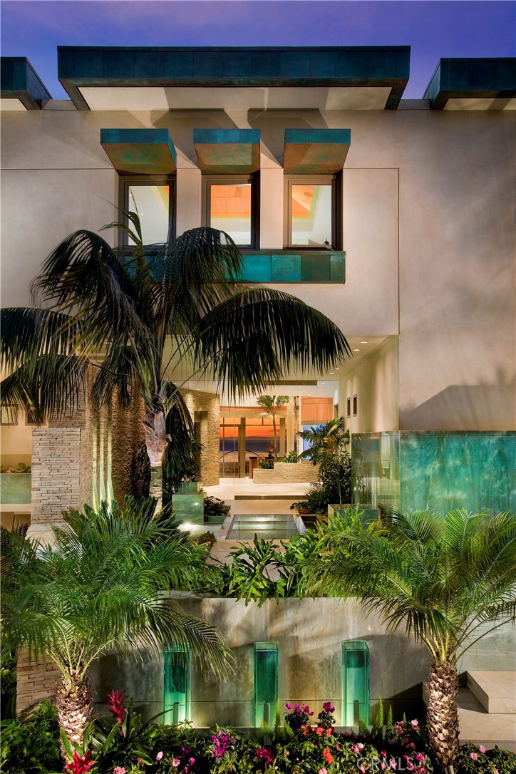 18 Ritz Cove Drive Dana Point, CA 92629 - Photo 3 of 25 a view of a swimming pool with potted plants and palm tree