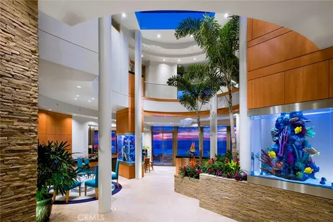 a view of living room with furniture and flowers