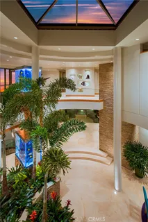 a kitchen with stainless steel appliances granite countertop a refrigerator and a stove