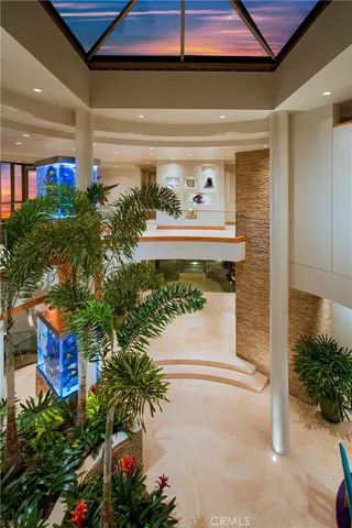 a kitchen with stainless steel appliances granite countertop a refrigerator and a stove