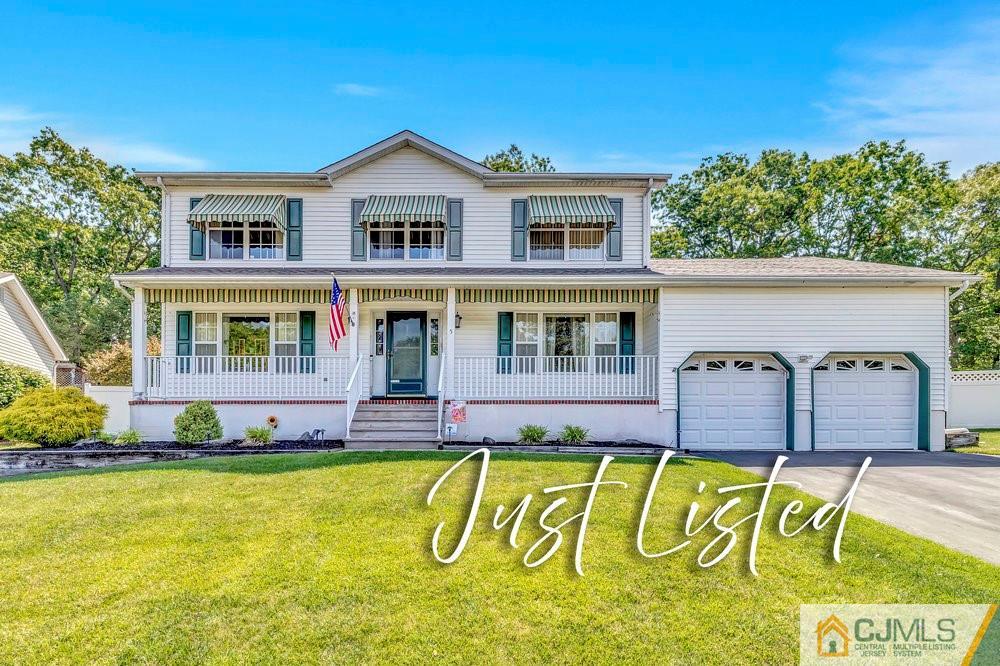 5 Netty Street Howell, NJ 07731 - Photo 1 of 36 a front view of house with a swimming pool